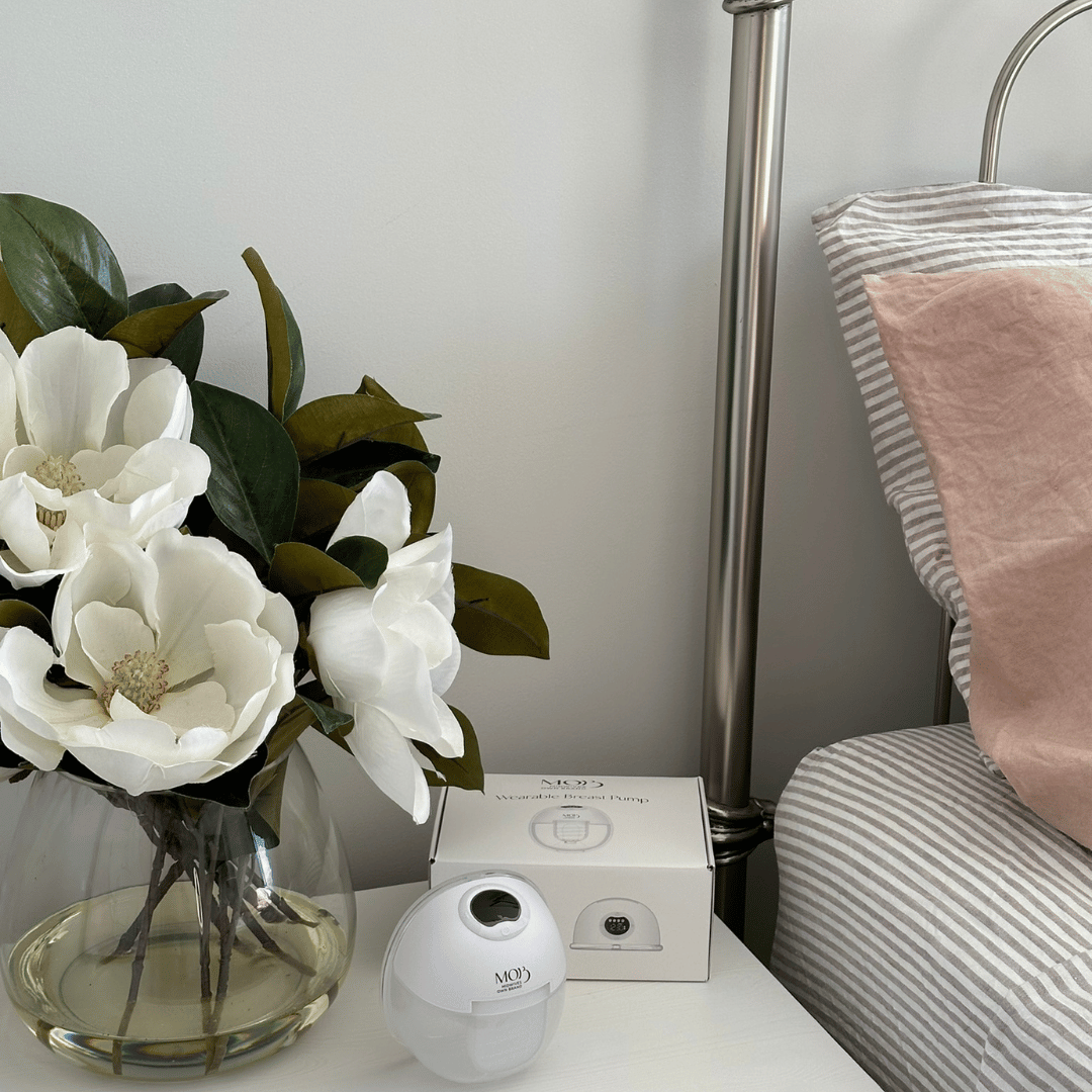 wearable breast pump by bedside