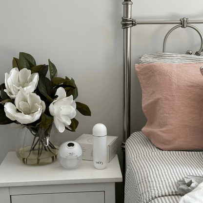 peri cleanse spray bottle and breast pump